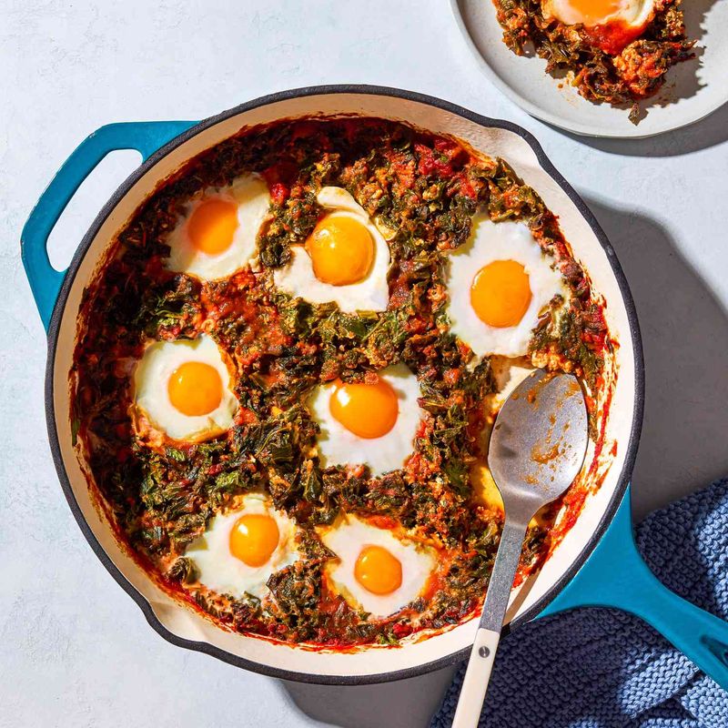 Baked Eggs In Tomato And Spinach Sauce