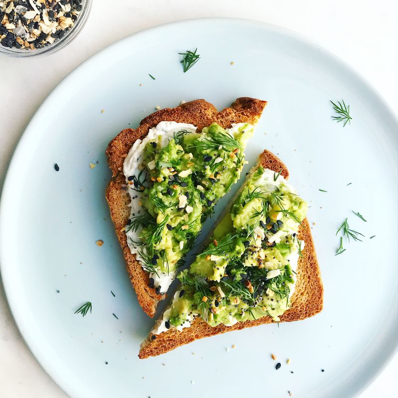 Avocado And Egg On Sprouted Grain Toast