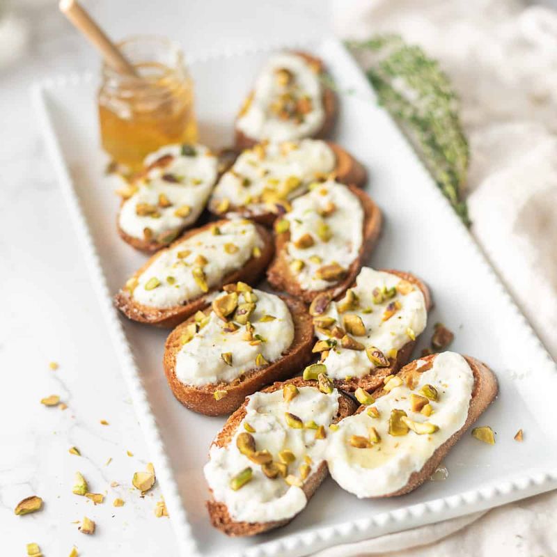 Pistachio and Honey Ricotta Crostini