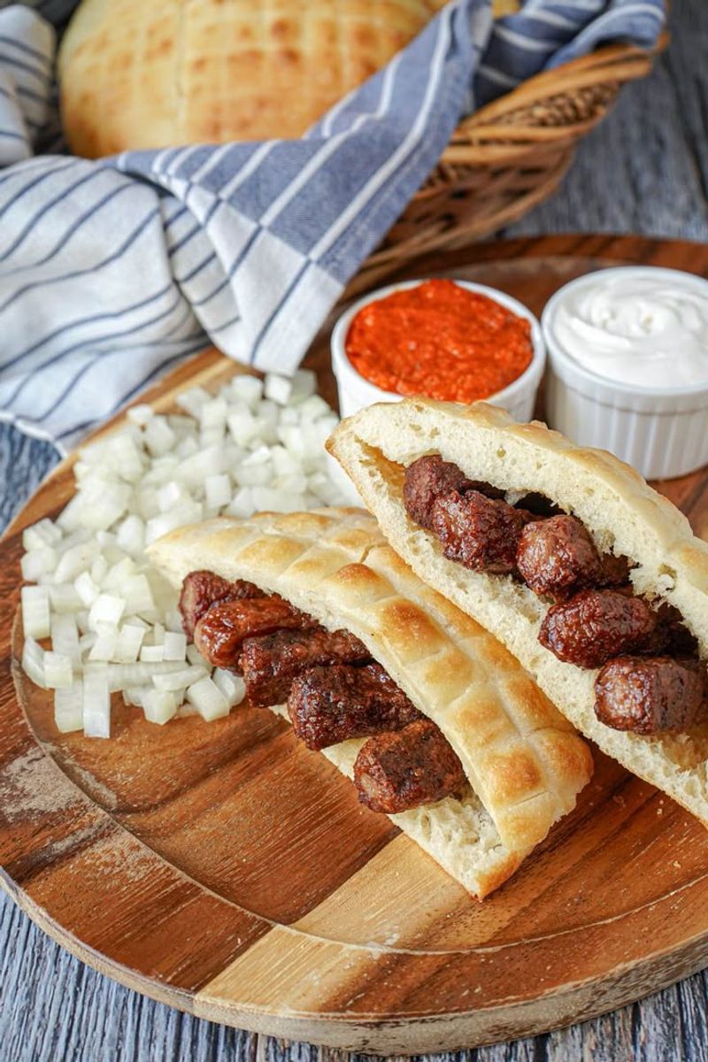 Cevapcici with Kajmak and Lepinja