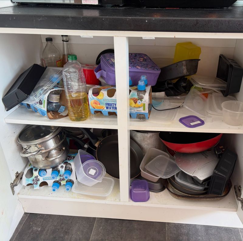 Mismatched Tupperware and Lidless Containers
