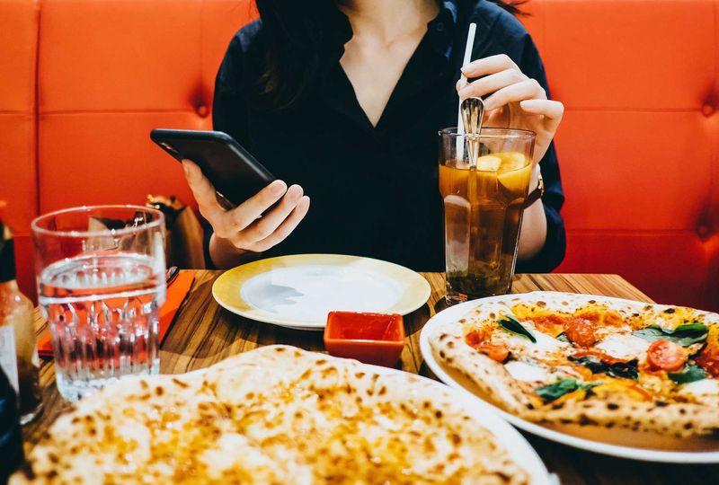 Phone Scrolling During a Meal