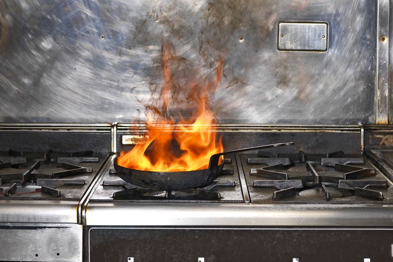 Ignoring Grease Buildup Near the Stove
