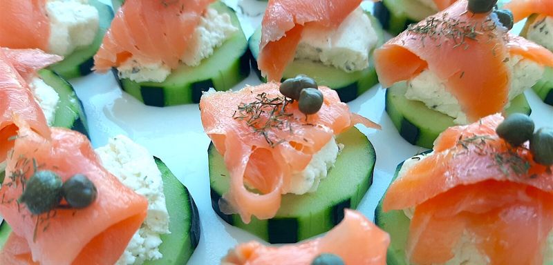 Smoked Salmon and Cream Cheese Roll-Ups on Cucumber Slices