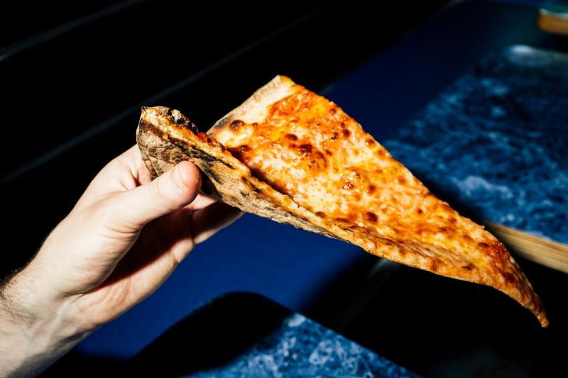 New York City: The Foldable Pizza Slice
