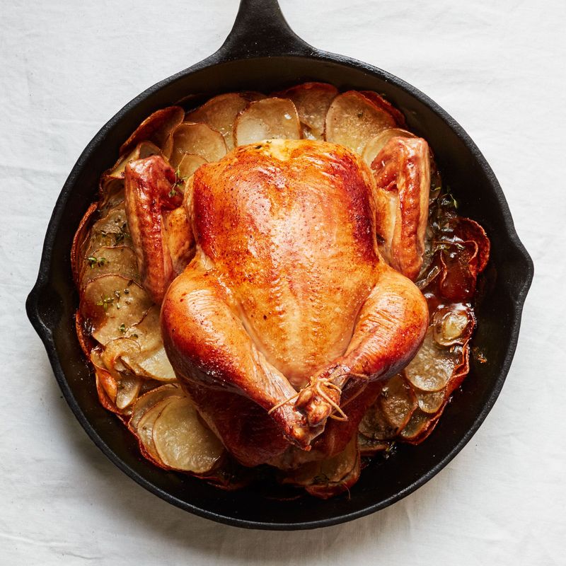 Whole Roast Chicken Over Potatoes