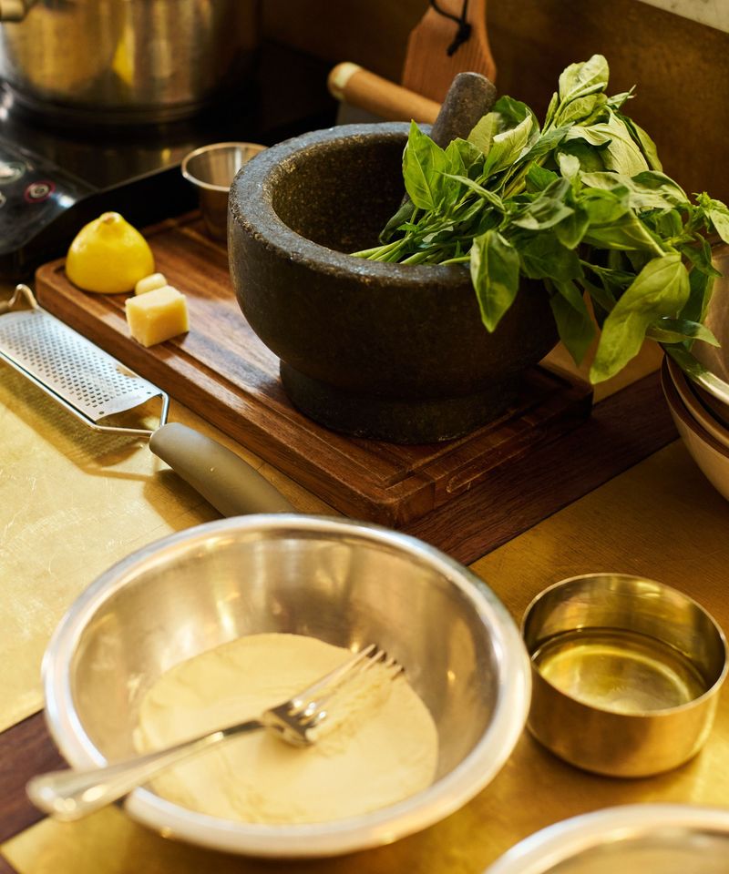 Bashing Herbs In A Pestle And Mortar