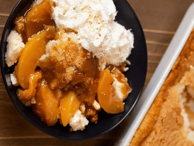 Warm Peach Cobbler With Whipped Cream