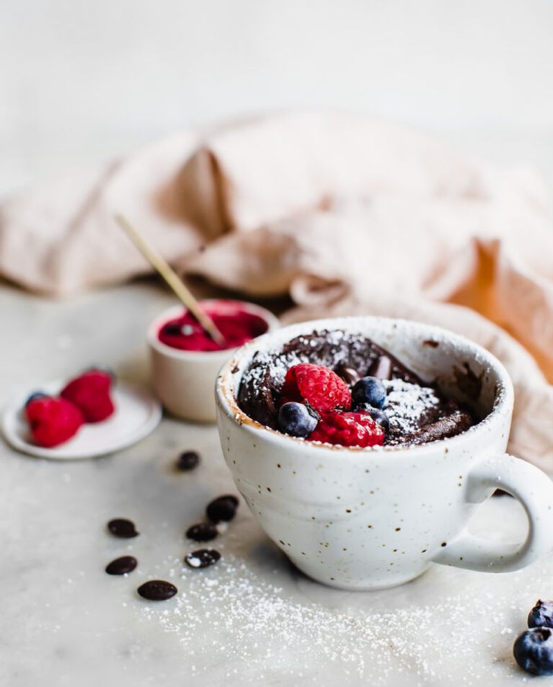 Chocolate Lava-Style Mug Cake With Raspberry Sauce