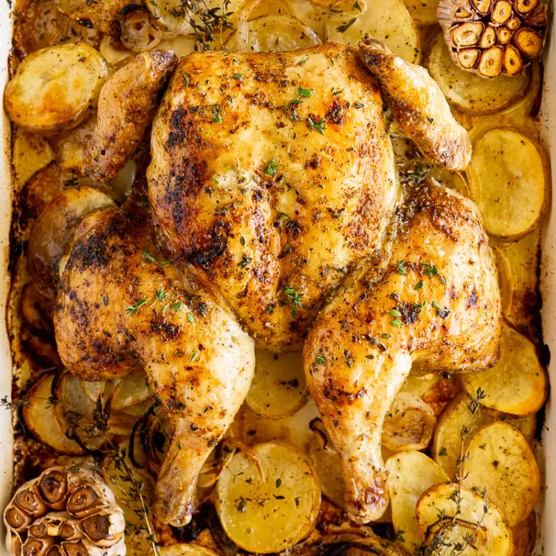 Whole Roasted Chicken with Golden Potatoes