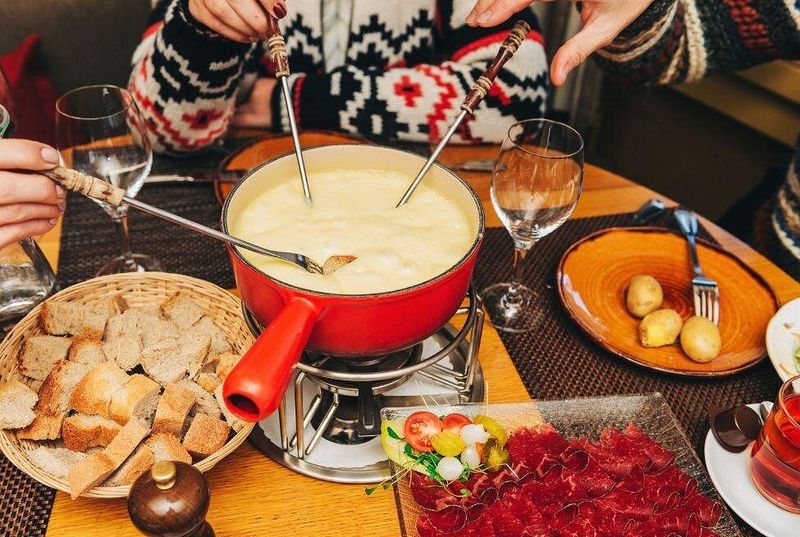 Cheese-Stuck Fondue Penalties in Switzerland